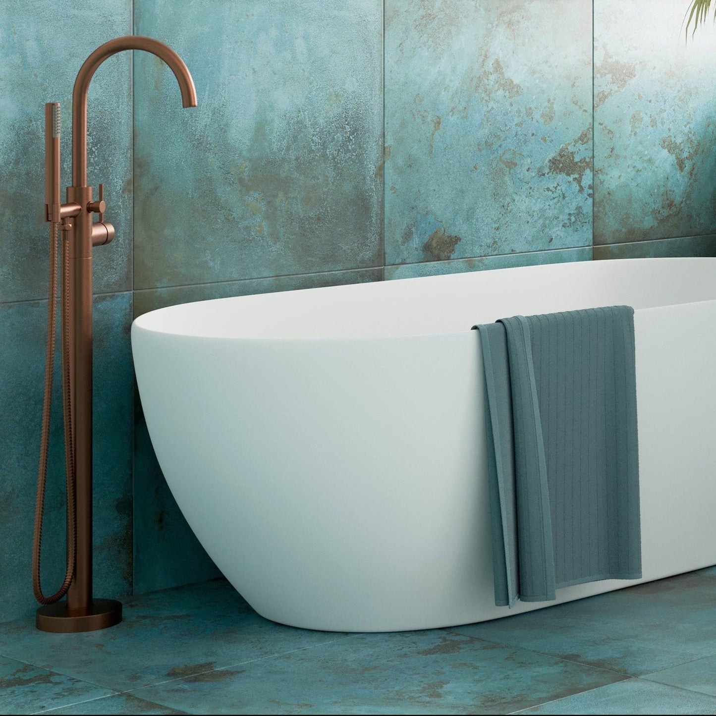 A finished design-led bathroom with coordinated brushed brass fittings